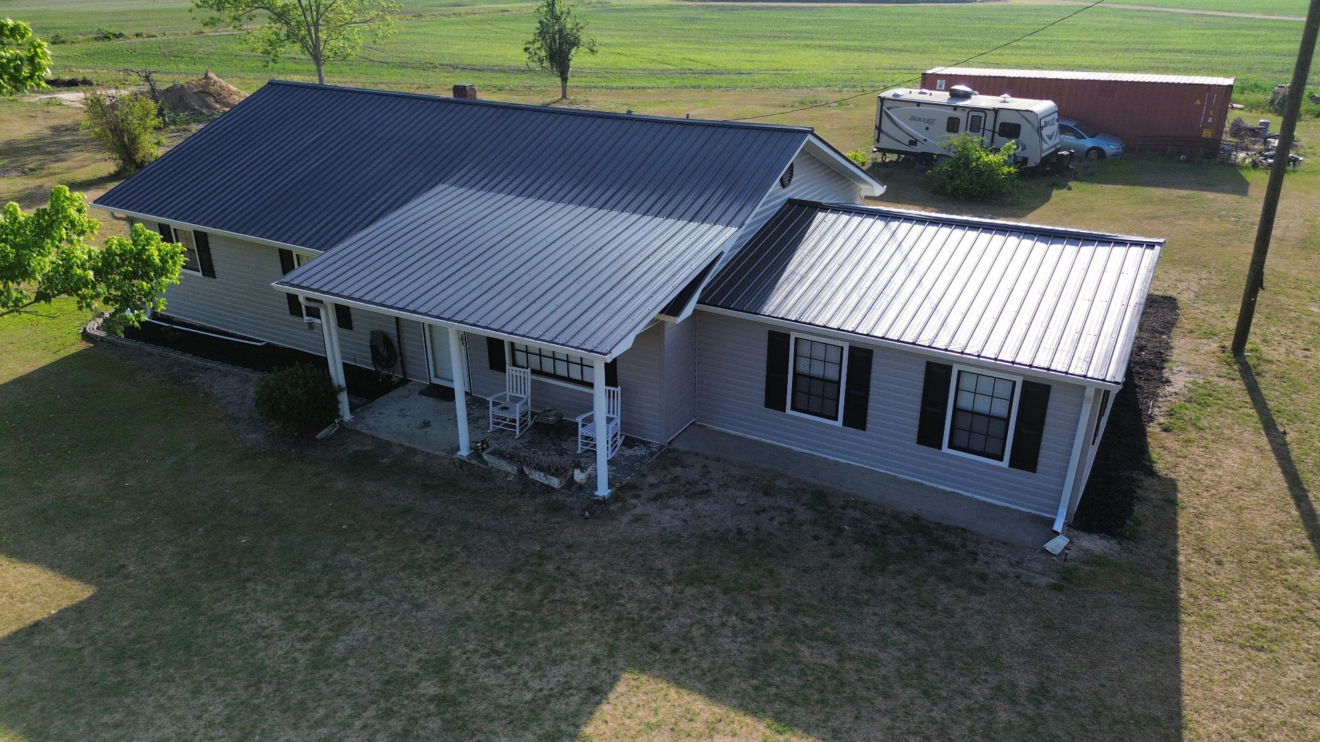 Same metal roof after Diamond Roof Restorations coating in charcoal